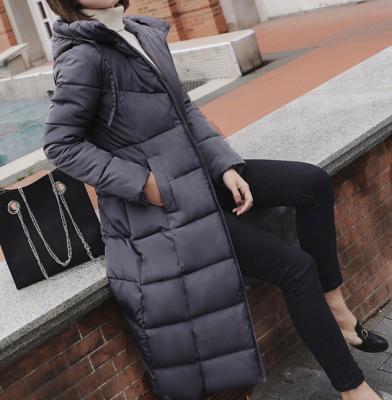 фото 1 Длинная зимняя куртка с капюшоном